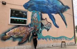 Palidoro, murales...di Moby Dick sulle mura della scuola elementare