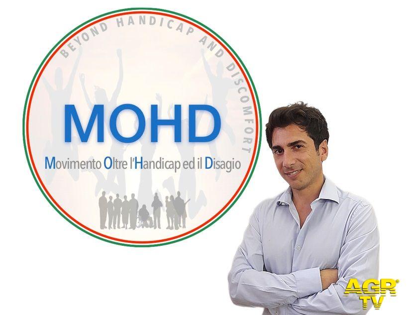 Dario Curti e simbolo del MOHD