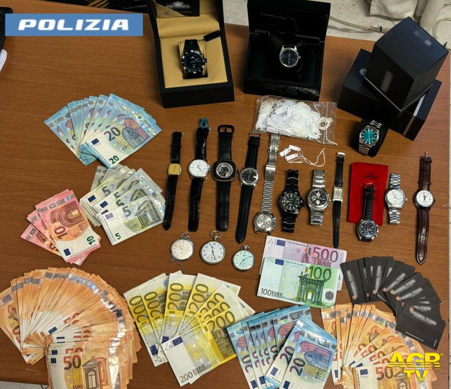 Polizia orologi soldi e materiale sequestrato