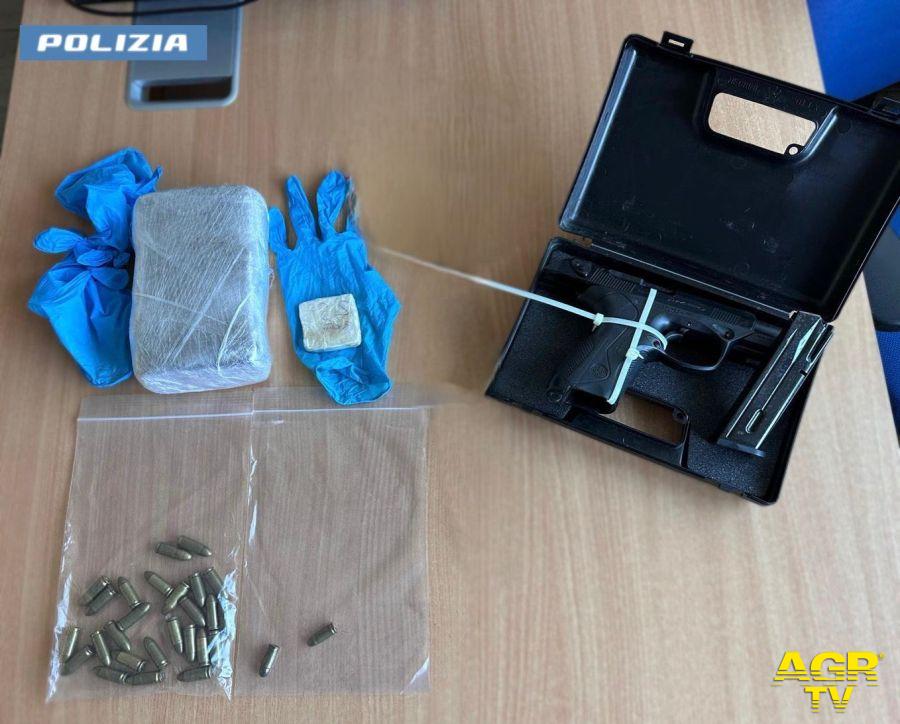 Polizia Ladispoli la pistola e la droga sequestrate