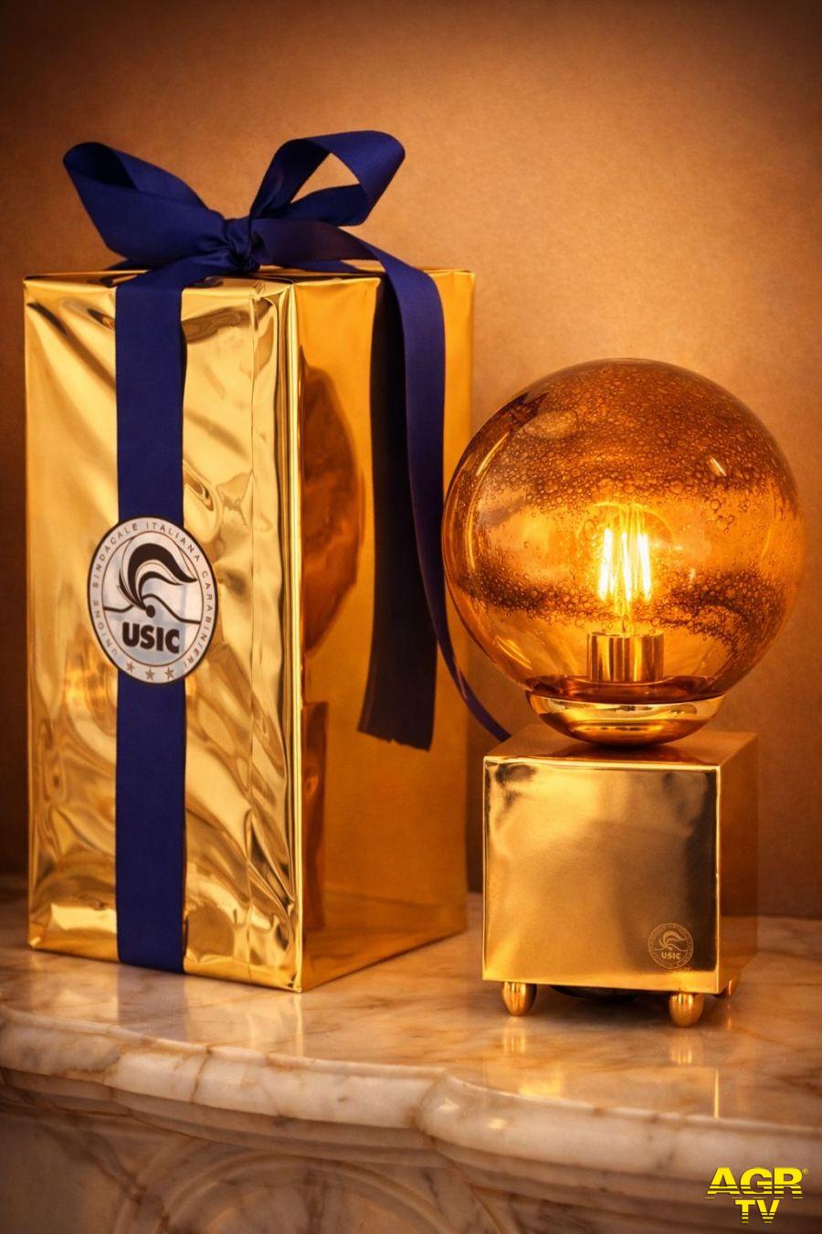 la “Sfera d’oro” del Maestro Scilla, emblema di responsabilità, valore e futuro.