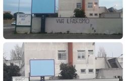 Fiumicino, rimosse le scritte fasciste dal muro della scuola